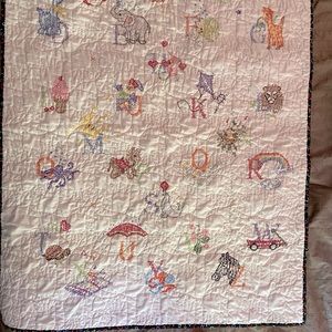 Baby quilt, alphabet cross stitch